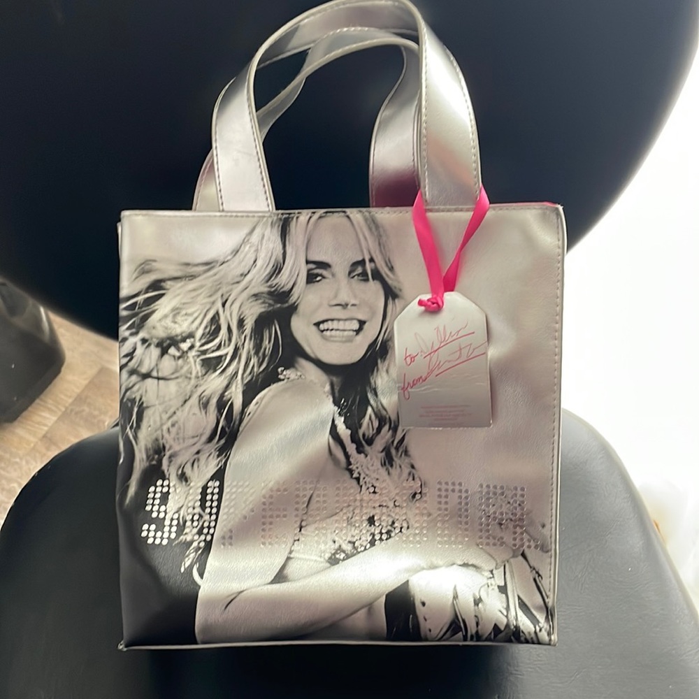 5/$25 Victorias Secret “Supermodel” silver handbag. With tags but name on tag